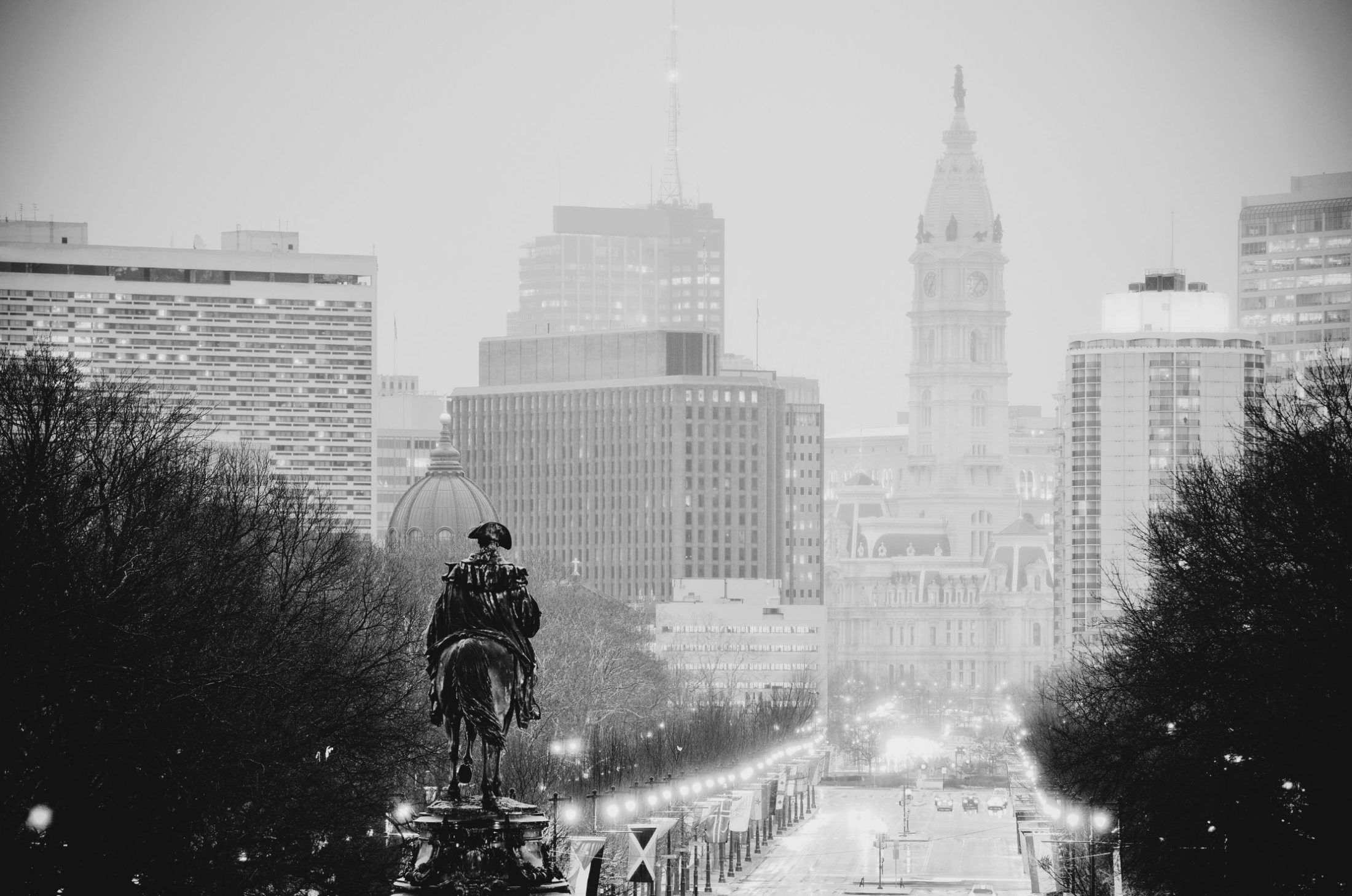 cityscape with statue